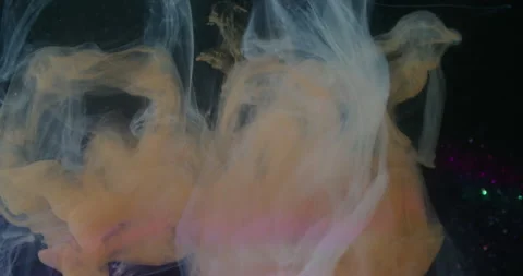 Paint drop swirling mist glitter broken light bulb Video stock 325314592