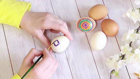 Paint Easter eggs with bright colors Stock Footage 234217627