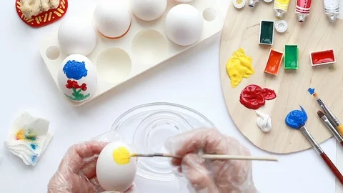 Paint the eggs with colors Stock Footage 112532746