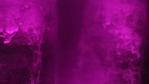 Paint fall into water which is twist. Spin acrylic ink drip into liquid. Visual Stock Footage 120726223