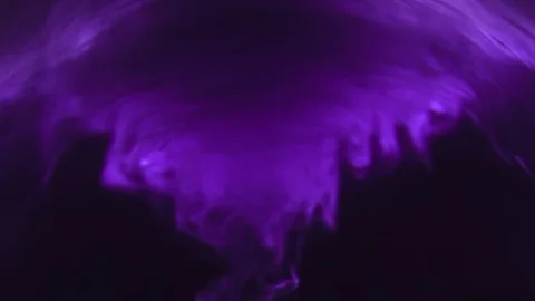 Paint fall into water which is twist. Spin acrylic ink drip into liquid. Visual Stock Footage 120940681