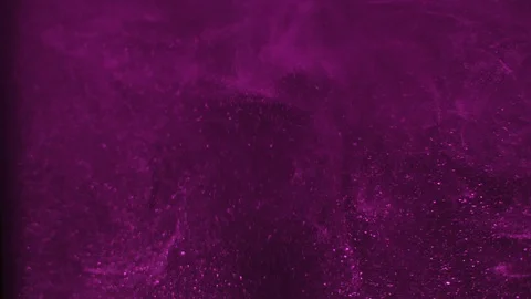 Paint fall into water which is twist. Spin acrylic ink drip into liquid. Visual Stock Footage 121936234