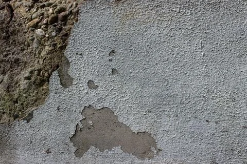 Paint falling of a concrete wall Stock Photos