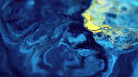 Paint flow sparkling ink spill blue yellow fluid Stock Footage 276909402