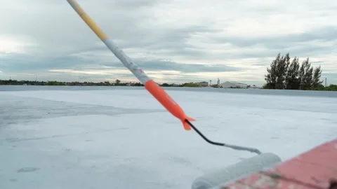 Paint the green floor with a paint roller for waterproof, reinforcing mesh, repa Stock Footage 169442857