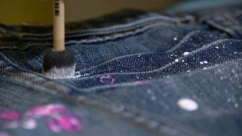 Paint a jeans clothes decor Stock Footage 115828073
