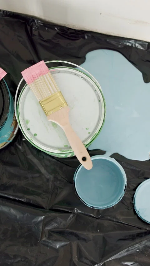 Paint, mess and tools for renovation in new house, maintenance or remodeling Stock Footage 336594371