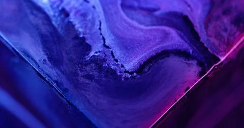 Paint mix neon flow light blend fluid spilling art Stock Photos