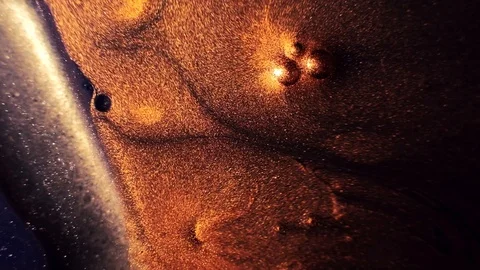 Paint movement bronze ink flow glitter fluid Stock Footage 116430173