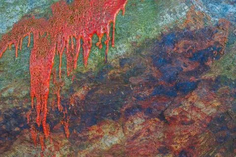 Paint or other liquid is splashed on the stone. Stock Photos