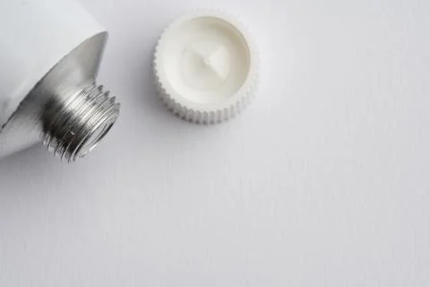 Paint or toothpaste or silicone metallic dispenser Stock Photos