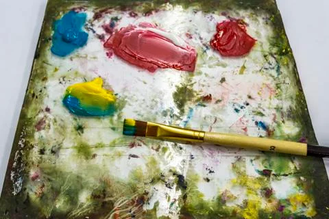 Paint palette with brush close up Foto stock