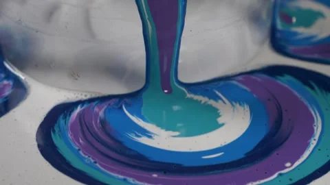 Paint pouring on a canvas with a cut bottle. diy art and creation. slow mot.. Stock Footage 238937002