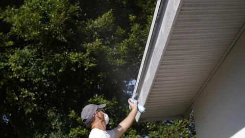 Paint Primer on Side of House Stock Footage 95489750