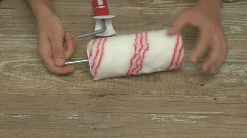 A Paint Roller and Handle are essential tools for efficient Home Improvement Stock Footage 281411174