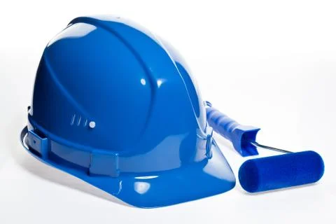 Paint roller and hardhat Stock Photos