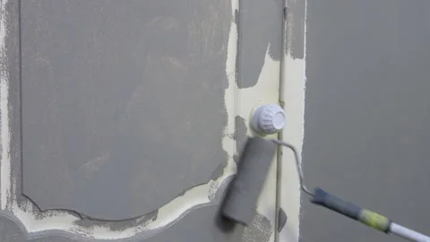 Paint Roller Applying Gray Paint Stock Footage 292134894