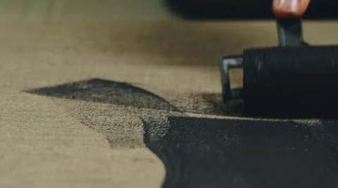 Paint roller in black Stock Footage 64763911