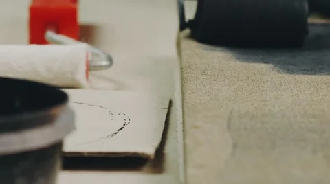 Paint roller in black slide left Stock Footage 64763919