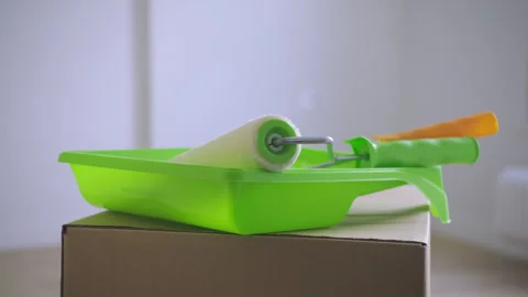 Paint Roller Box Close-Up in New Room in 4K Stock Footage 313347097