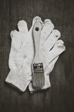 Paint roller brushes working gloves Stock Photos