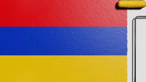 Paint roller with a chrome handle rolls paint flag Armenia Video stock 160407350