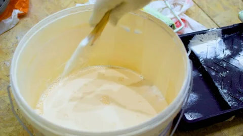 Paint roller close up. Repair in the new house. HD Видео 99330423