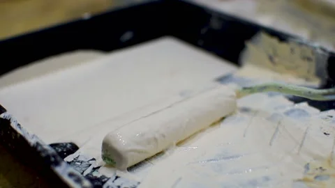 Paint roller close up. Repair in the new house. HD 스톡 동영상 99330735