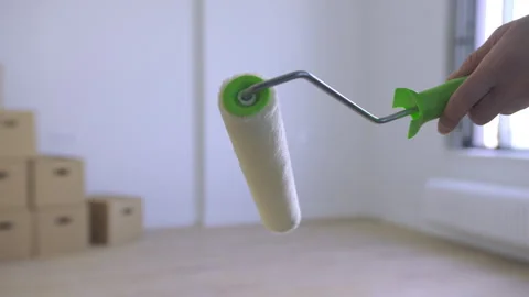 The paint roller is displayed in a showcase in the new house. Stock Footage 313679344