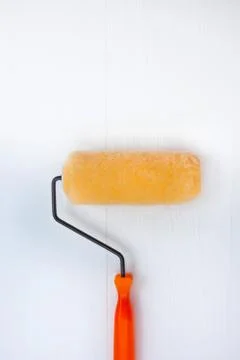 Paint roller isolated on white background. Stock Photos