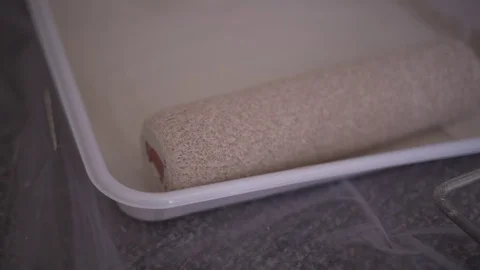 Paint Roller Laying In Paint Tray Handheld Stock Footage 88013778
