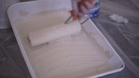Paint Roller In Light Brown Paint Tray Painting Room Stock Footage 88013707
