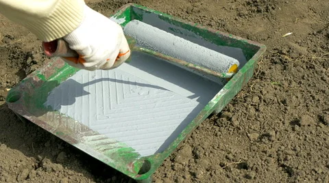 Paint roller in paint can Stock Footage 62222547