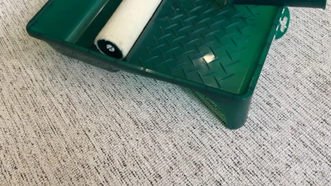 Paint roller with paint in container room. Stock Footage 270309004