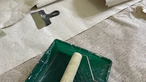 Paint roller with paint in container room. Stock-Footage 273109669