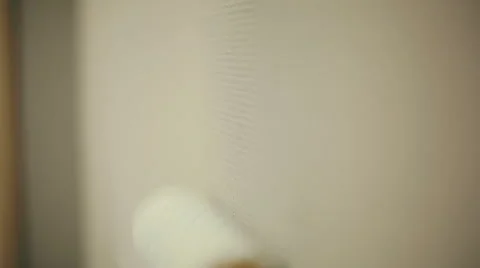 Paint roller to wall Stock Footage 52089395
