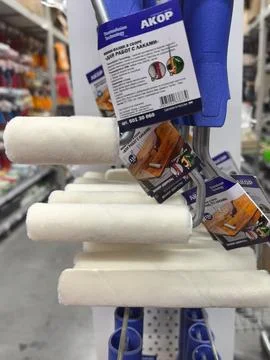 Paint rollers ready for vibrant home transformation in a hardware store Stock Photos