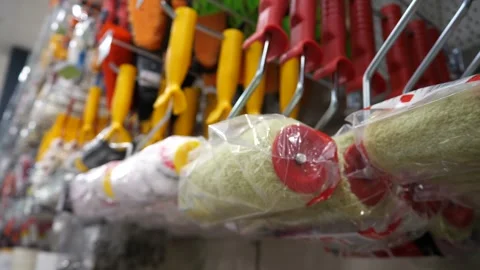 Paint rollers on a store shelf. Stock Footage 310134348