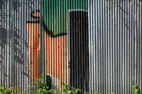 Paint with scratch on the galvanized iron wall plate. background and texture Stock Photos