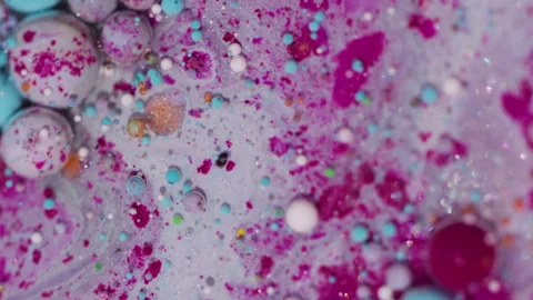 Paint spatter ink spill glitter oil water art wet Stock Footage 330837374