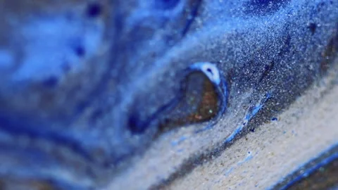 Paint spill glitter fluid flow blue shimmering ink Stock Footage 280155535