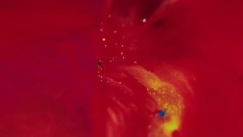 Paint splash glitter fluid bubble red golden ink Video stock 274624902