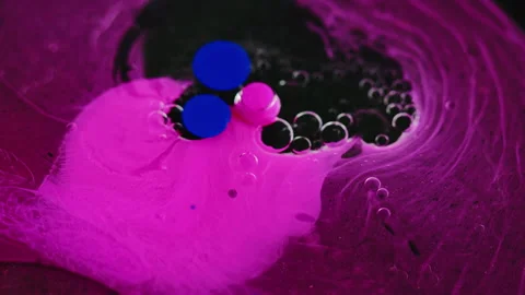 Paint splash oil bubbles ink water mix pink purple Stock Footage 268149268