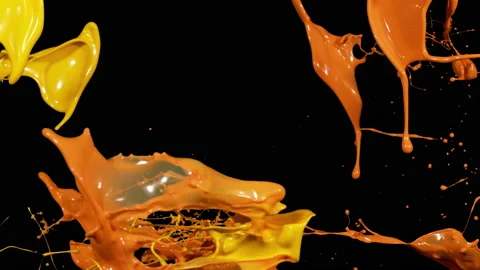 Paint splashing Effect Slowmotion,Orange and Yellow Paint splatter Stock Footage 153401255