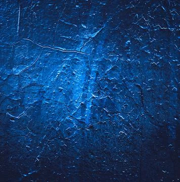 Paint spots. Rock surface with cracks. Rock texture. Dark stone wall. Stone b Stock Photos
