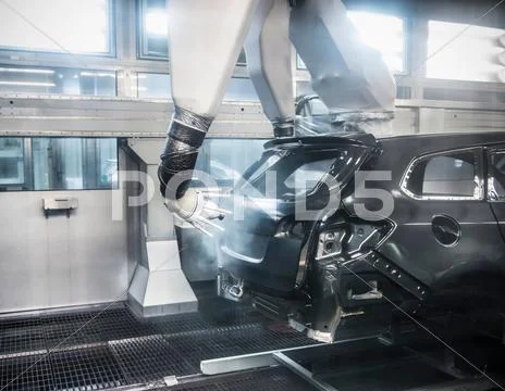 Paint Spraying Robots In Car Factory