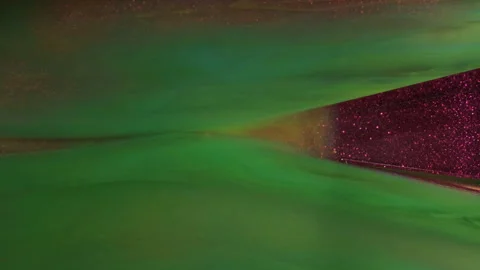 Paint stream ink color liquid glow water shimmer Video stock 303877230