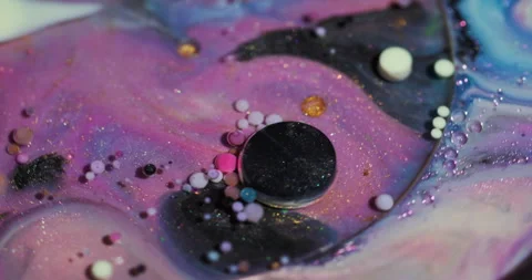 Paint stream oil bubbles sparkling water glitter Stock Footage 318567154