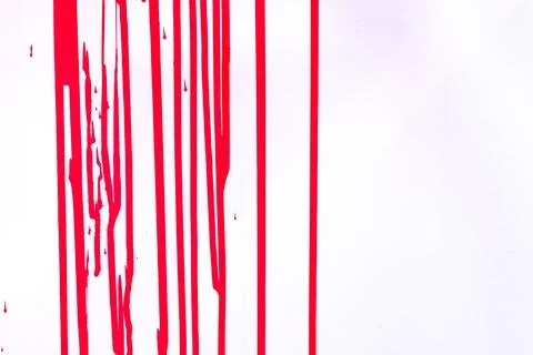 Paint streams on a pink light surface. A background with red, crimson strip.. Stock Photos