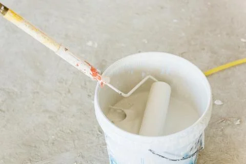 Paint tank and paint roller viewed from above Stock Photos
